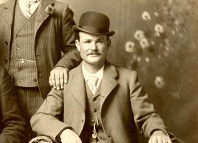 An old-time photo of Butch Cassidy posing