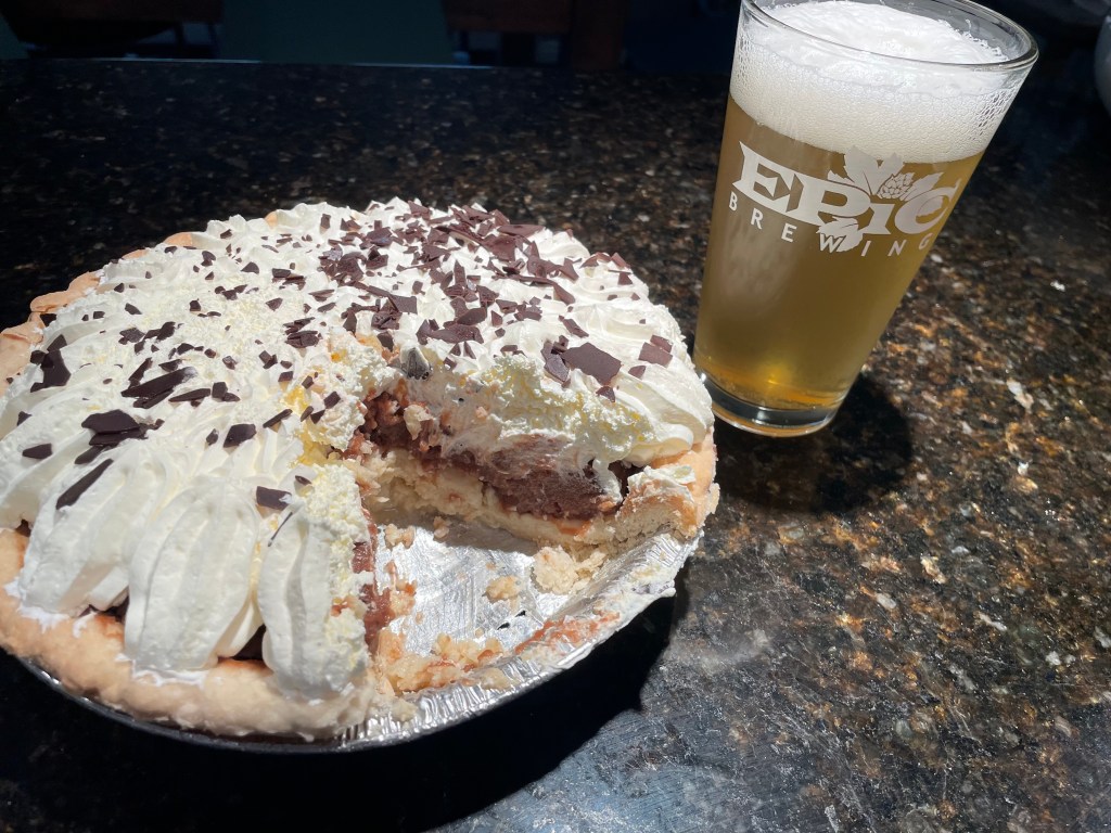 A chocolate cream pie and a pint of beer.