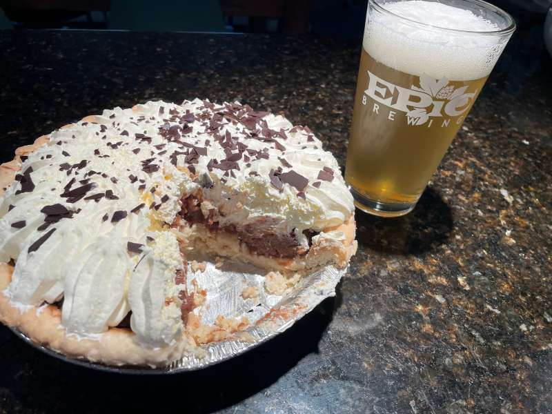 A chocolate cream pie and a pint of beer.