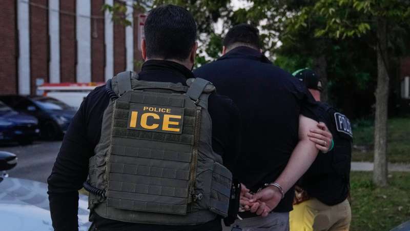 ice officer makes an arrest