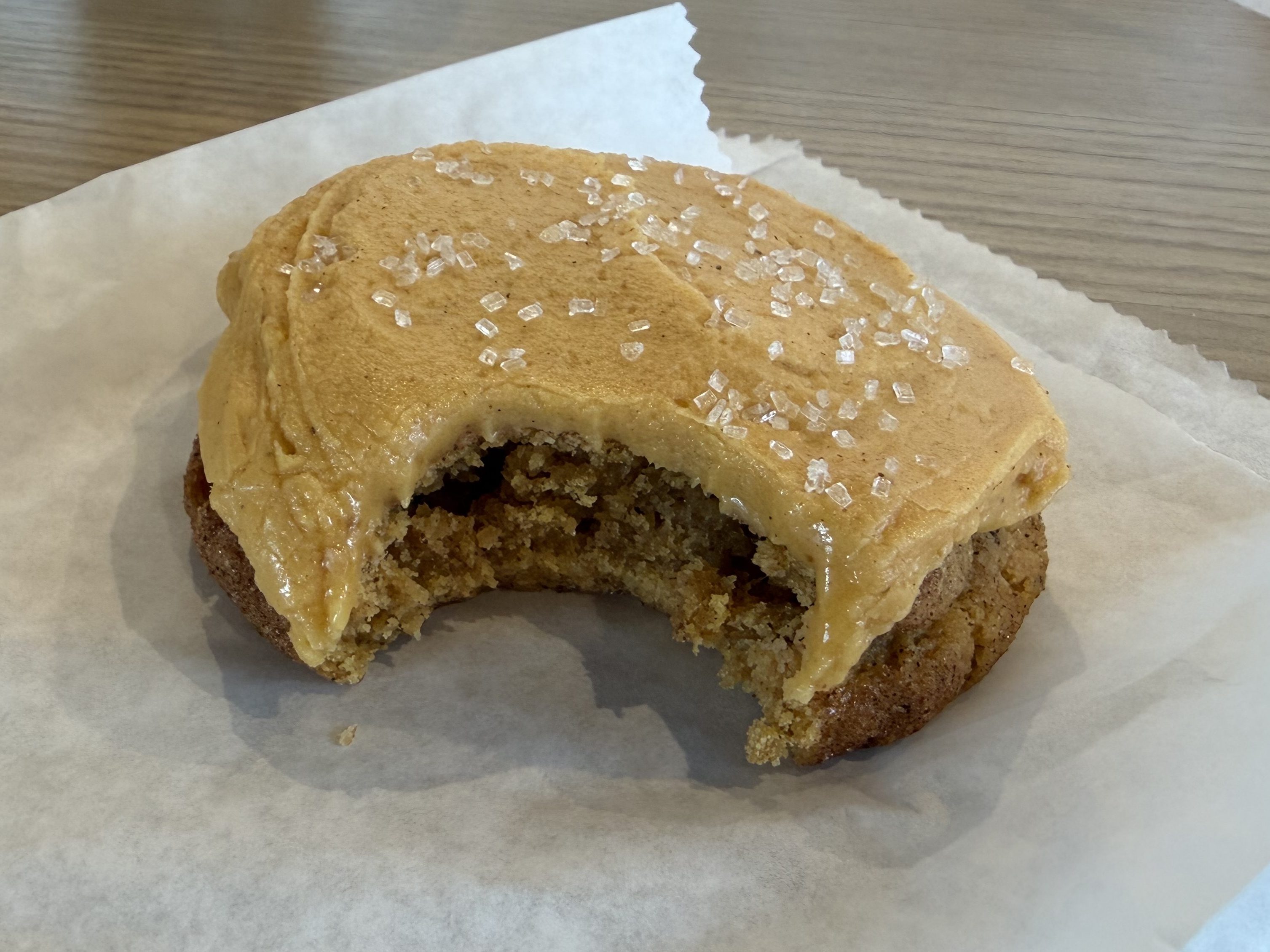 Salted pumpkin snickerdoodle sits atop a white wrapper.