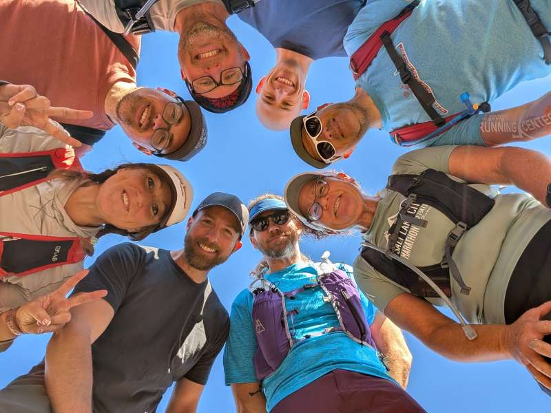 A group of Utah locals gather, looking down on the camera.